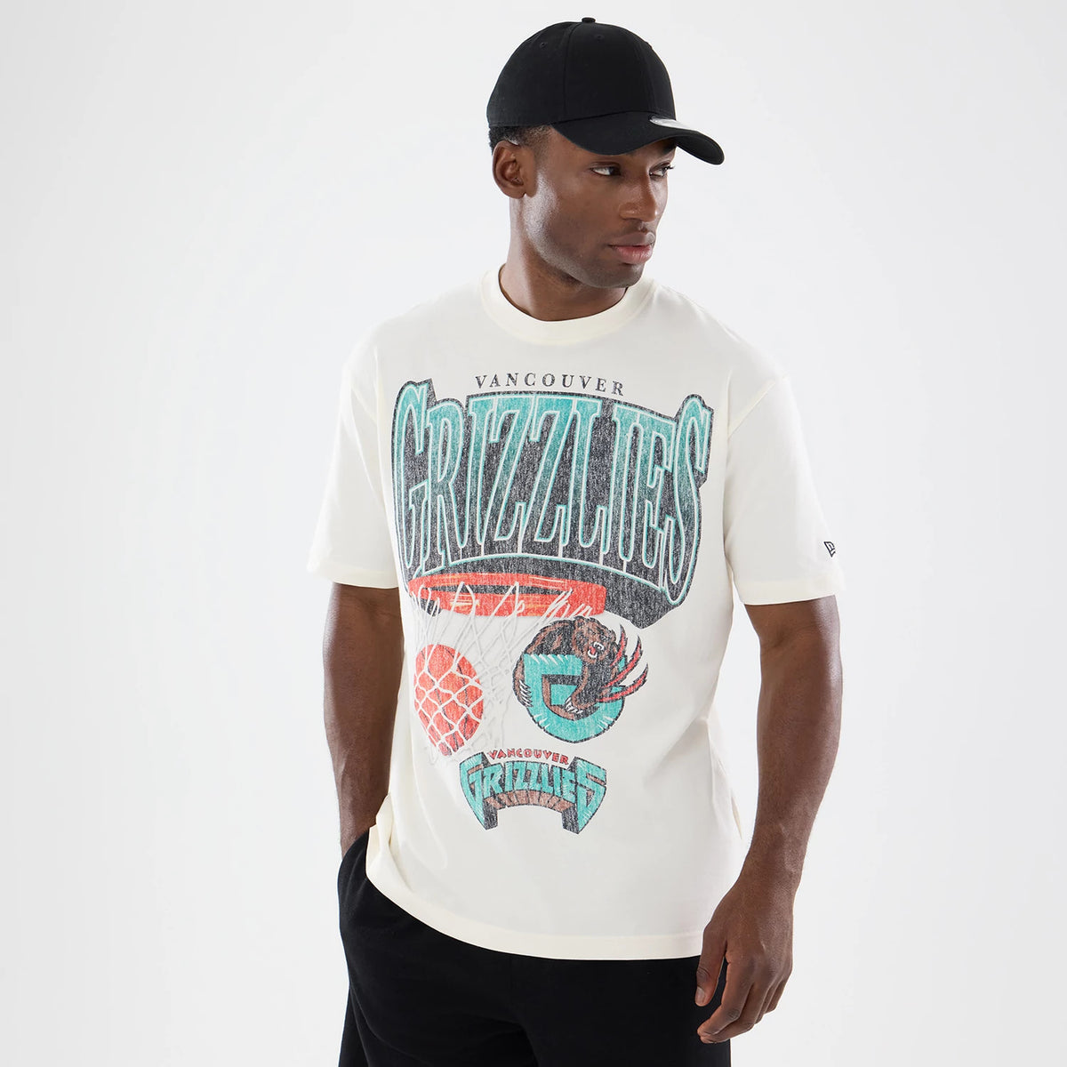 The model is wearing this NBA Sport Classic Vancouver Grizzlies T-Shirt in cream. 1