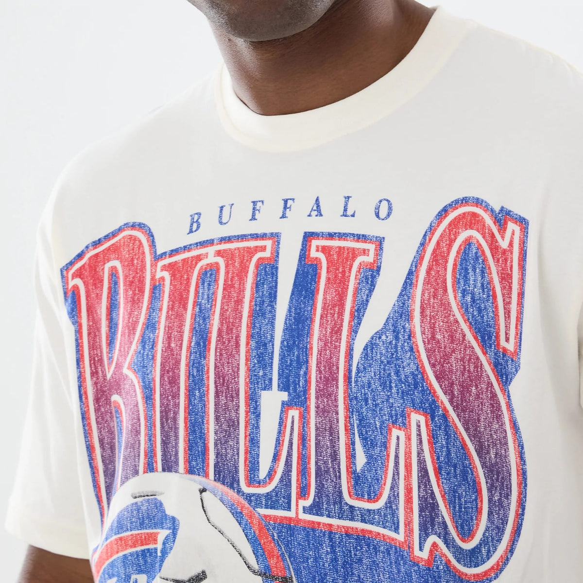 The model is wearing this NFL Sport Classic Buffalo Bills T-Shirt in Cream. 4