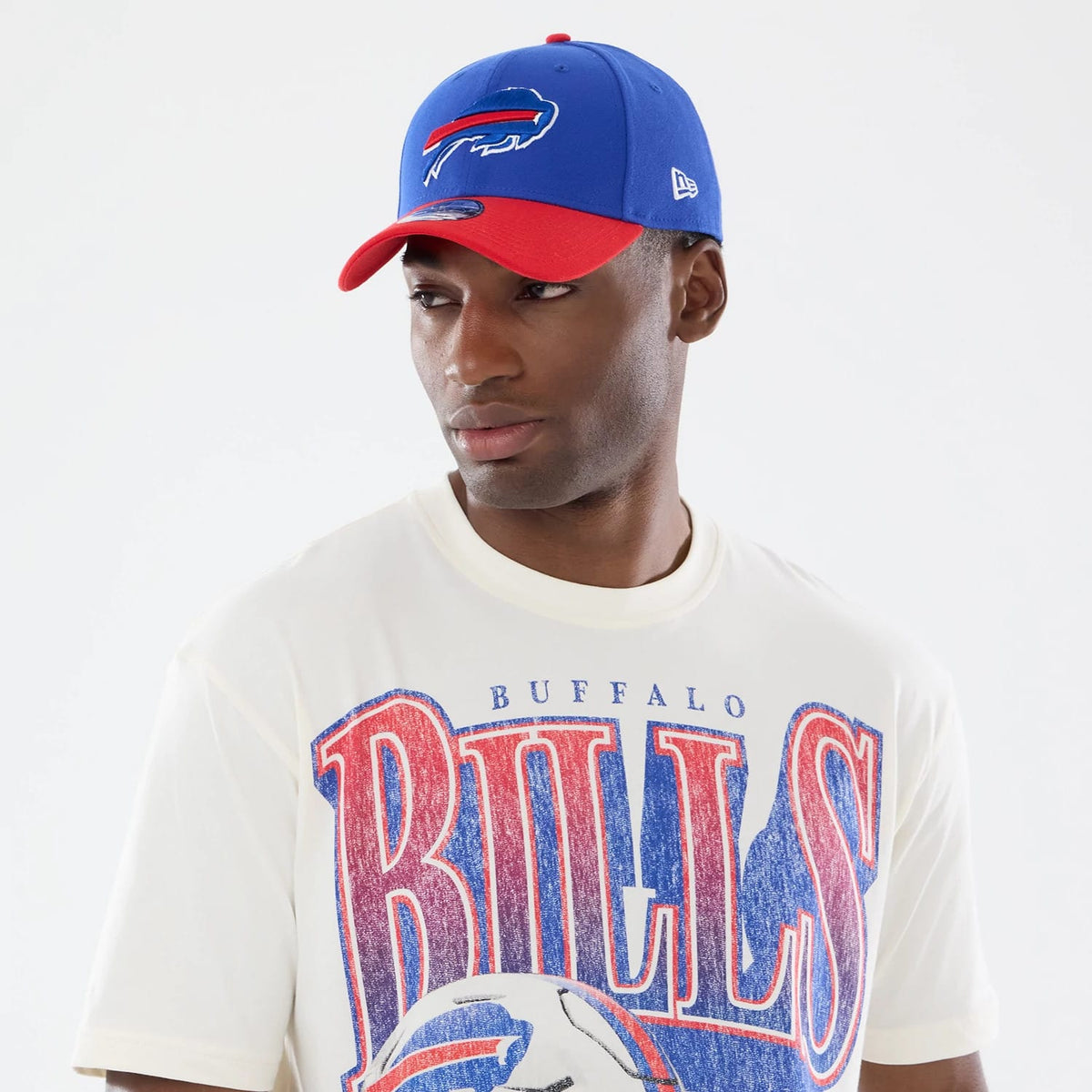 The model is wearing this NFL Sport Classic Buffalo Bills T-Shirt in Cream. 6