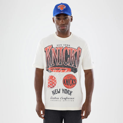 The model is wearing this NBA Sport Classic New York Knicks T-Shirt in cream. 1