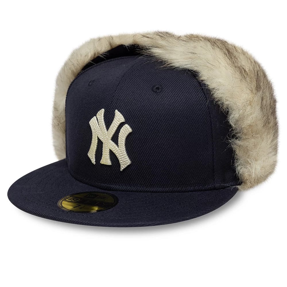 Pictured is this MLB Cotton Canvas New York Yankees Dogear 59FIFTY Fitted cap in navy. 1