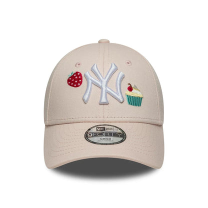 Pictured is this Child MLB Food Icon New York Yankees 9FORTY cap in pastel pink. 2