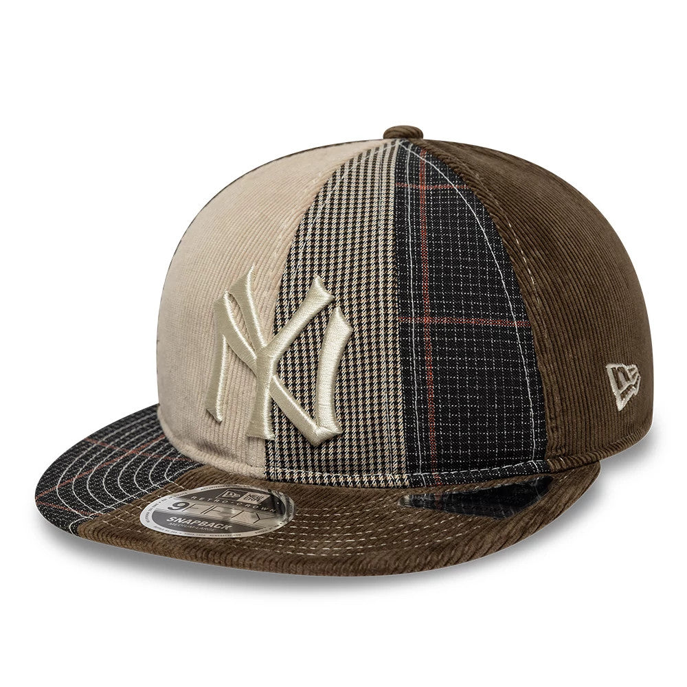 Yankees MLB Patchwork Dark Brown Retro Crown New Era 9FIFTY Adjustable Cap, front view showing a raised embroidered Yankees logo on a patchwork front panel with varied patterns, a matching dark brown corduroy flat visor, and a 9FIFTY size sticker.