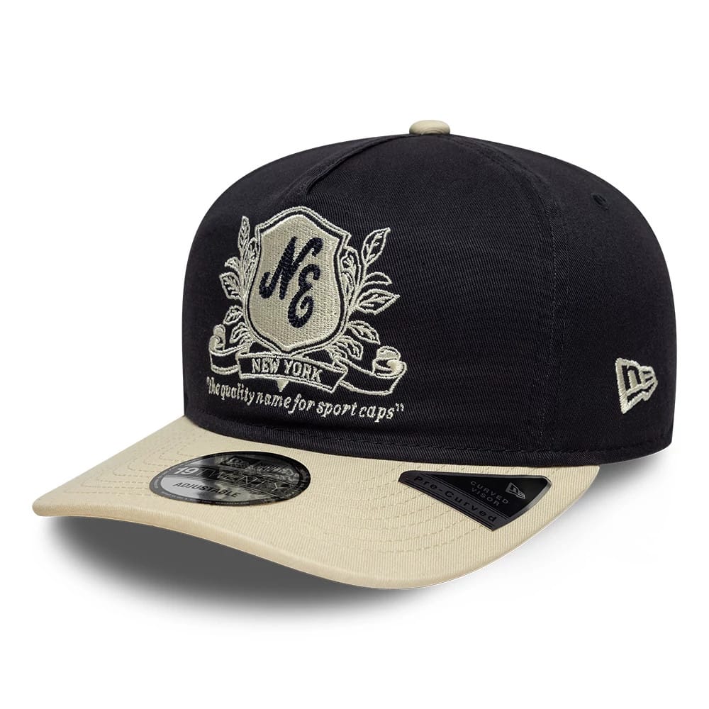Pictured is this New Era Washed Graphic 19TWENTY cap in navy. 1