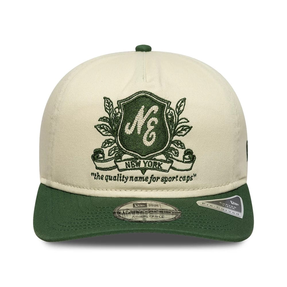 Pictured is this New Era Washed Graphic 19TWENTY cap in cream. 2