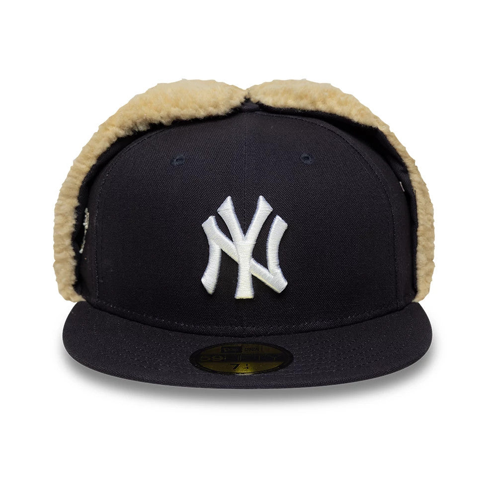 Pictured is this MLB World Series New York Yankees Dogear 59FIFTY Fitted cap in navy. 3