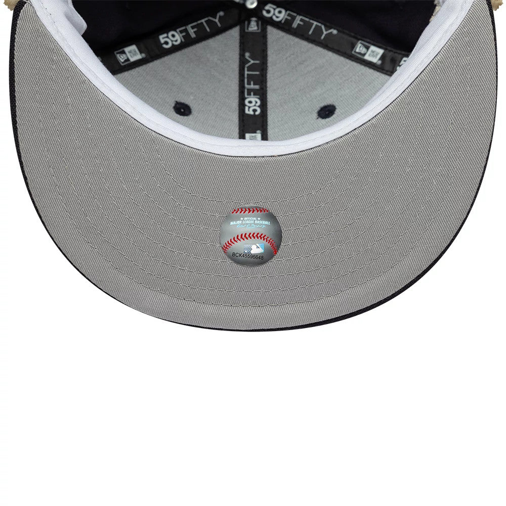 Pictured is this MLB World Series New York Yankees Dogear 59FIFTY Fitted cap in navy. 9