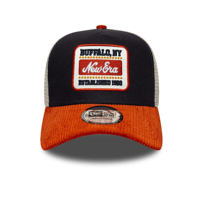 Pictured is this New Era Patch Cord 9FORTY A-Frame Trucker cap in navy & red. 2