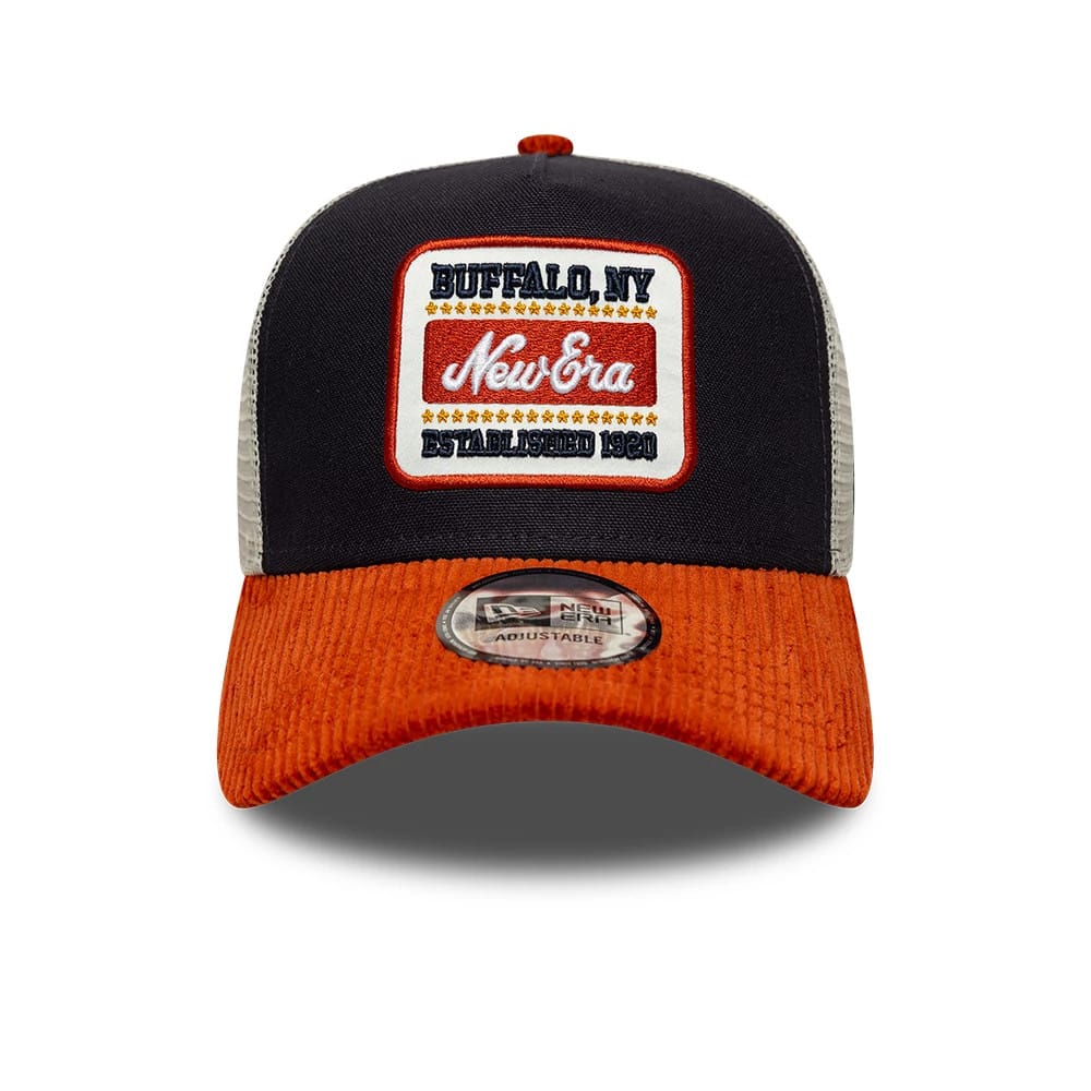 Pictured is this New Era Patch Cord 9FORTY A-Frame Trucker cap in navy. 2