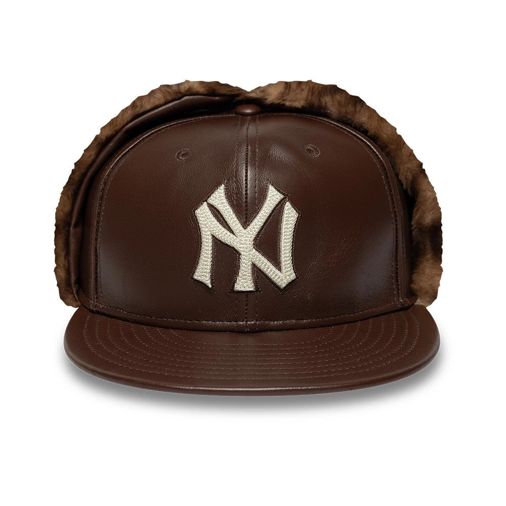 Pictured is this MLB Leather New York Yankees Dogear 59FIFTY Fitted cap in brown. 4