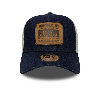 Pictured is this New Era Patch Denim 9FORTY A-Frame Trucker cap in dark blue. 2