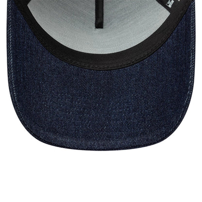 Pictured is this New Era Patch Denim 9FORTY A-Frame Trucker cap in dark blue. 5