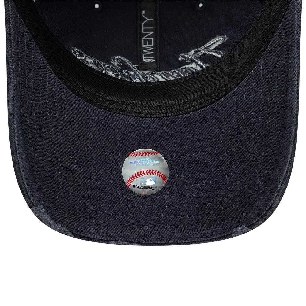 Pictured is this MLB Distressed Denim New York Yankees 9TWENTY cap in navy. 5