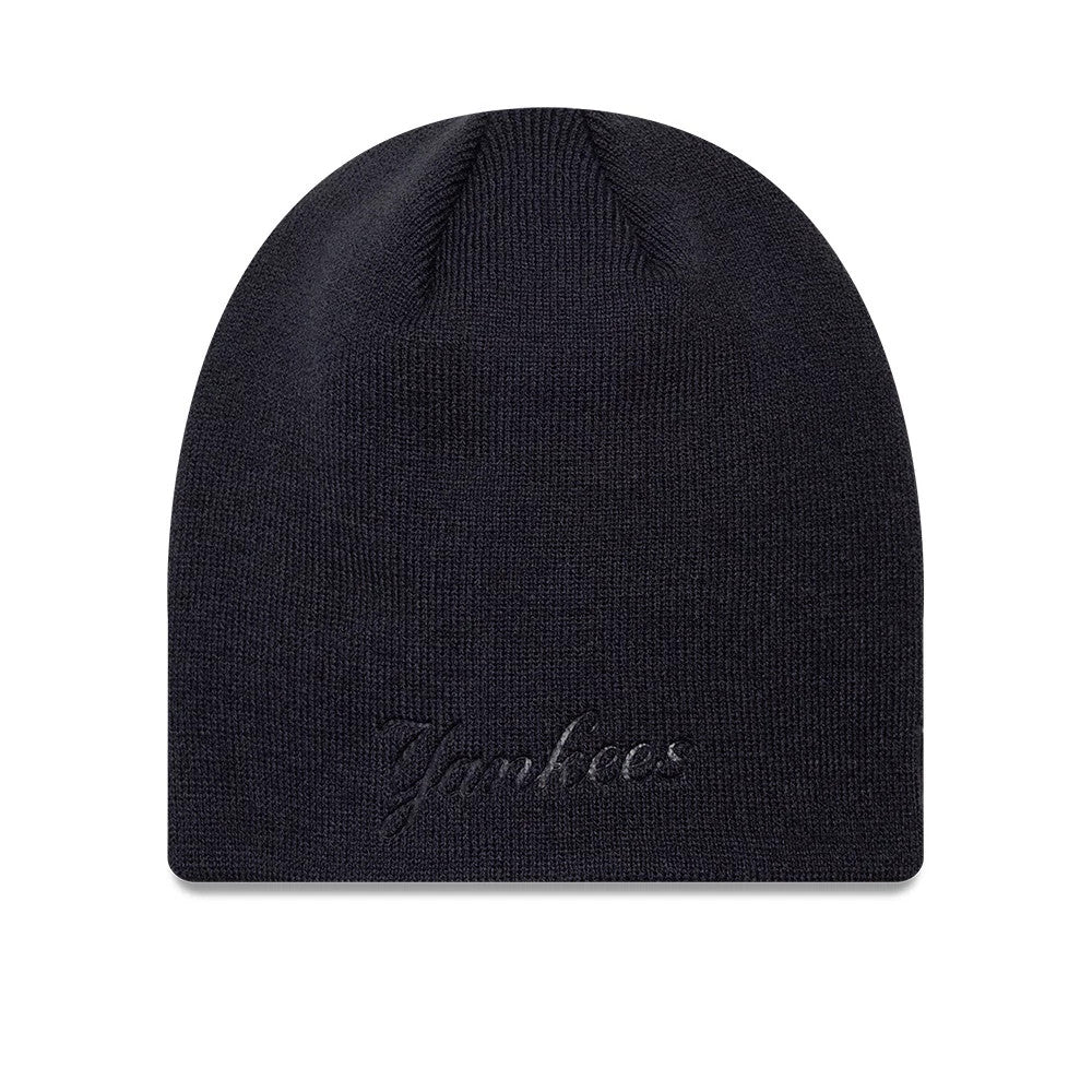Pictured is this MLB Script New York Yankees Skull Knit Beanie hat in navy. 1