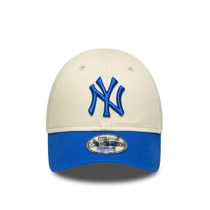 Pictured is this Toddler MLB League Essential New York Yankees 9FORTY cap in cream & blue. 2