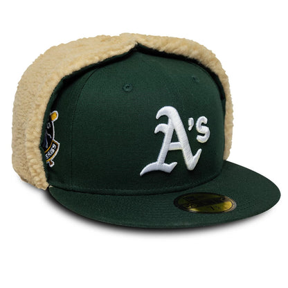Pictured is this MLB World Series Athletics Dogear 59FIFTY Fitted cap in dark green. 1