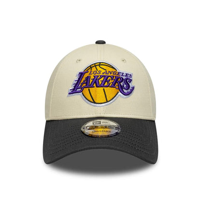 Pictured is this NBA Colourblock LA Lakers 9FORTY cap in cream. 2