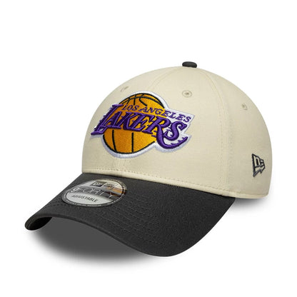 Pictured is this NBA Colourblock LA Lakers 9FORTY cap in cream. 1