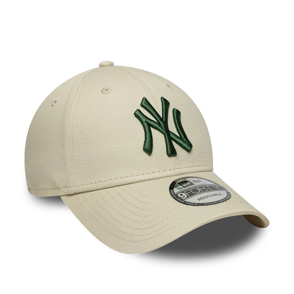 Pictured is this MLB League Essential New York Yankees 9FORTY cap in cream. 3