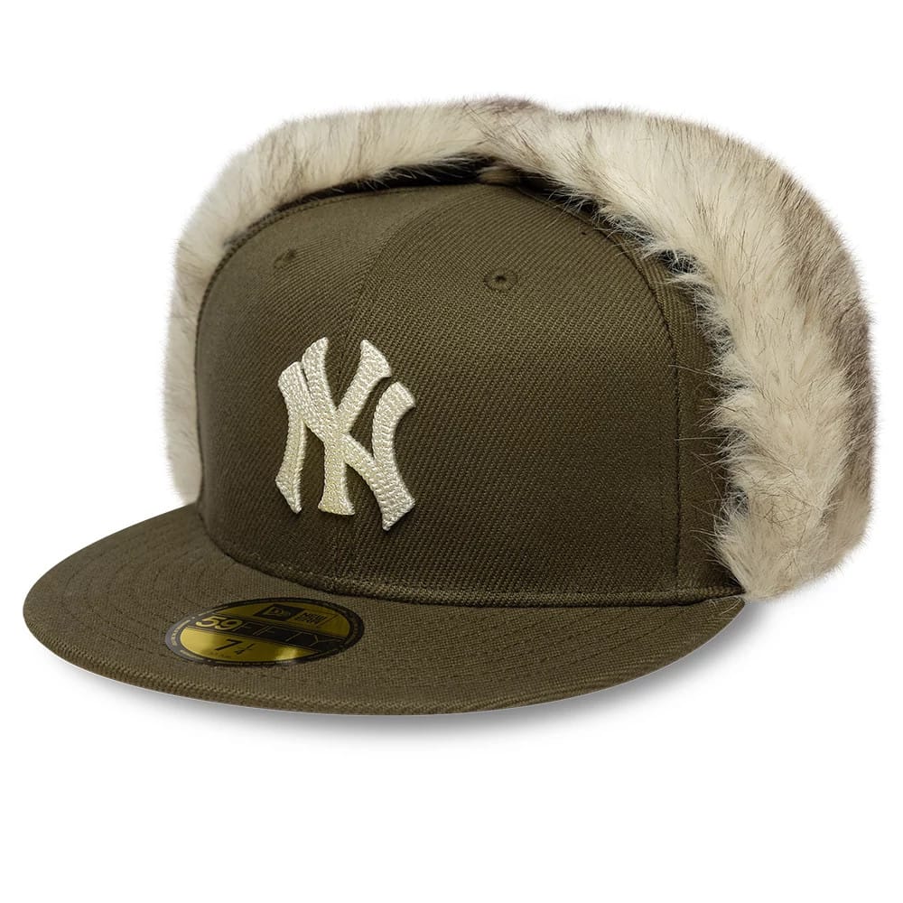 Pictured is this MLB Cotton Canvas New York Yankees Dogear 59FIFTY Fitted cap in dark green. 1