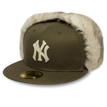 Pictured is this MLB Cotton Canvas New York Yankees Dogear 59FIFTY Fitted cap in dark green. 1
