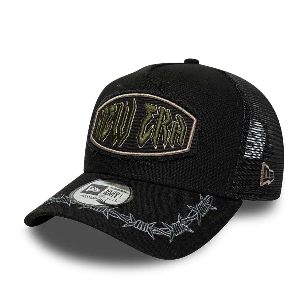 Pictured is this New Era Distressed Patch 9FORTY E-Frame Trucker cap in black. 1