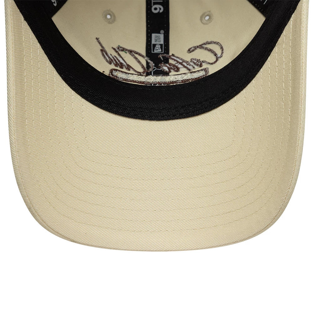Pictured is this Womens New Era Café Slogan 9TWENTY cap in cream. 5