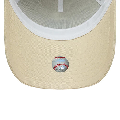 Pictured is this MLB Outline New York Yankees 9FORTY E-Frame Trucker cap in cream. 5
