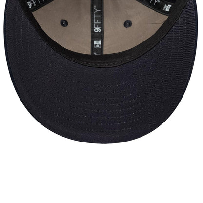 Pictured is this New Era Suede Retro Crown 9FIFTY cap in navy. 5