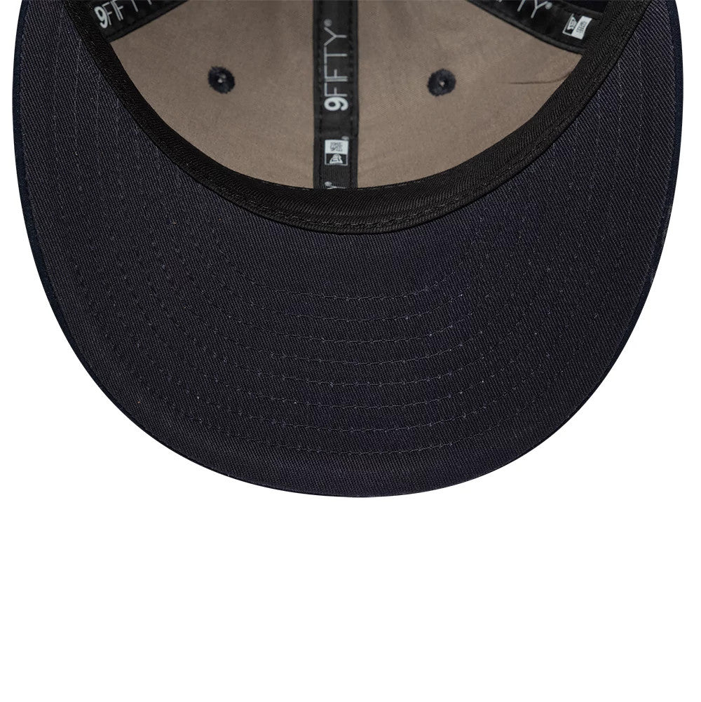 Pictured is this New Era Suede Retro Crown 9FIFTY cap in navy. 5