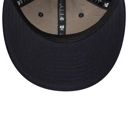 Pictured is this New Era Suede Retro Crown 9FIFTY cap in navy. 5