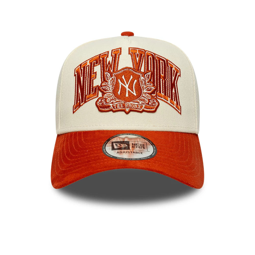 New York Yankees MLB Suede Cream & Orange New Era 9FORTY E-Frame Adjustable Cap, front view showing the raised orange embroidered New York logo on cream panels, with an orange curved visor and a 9FORTY size sticker on the visor.