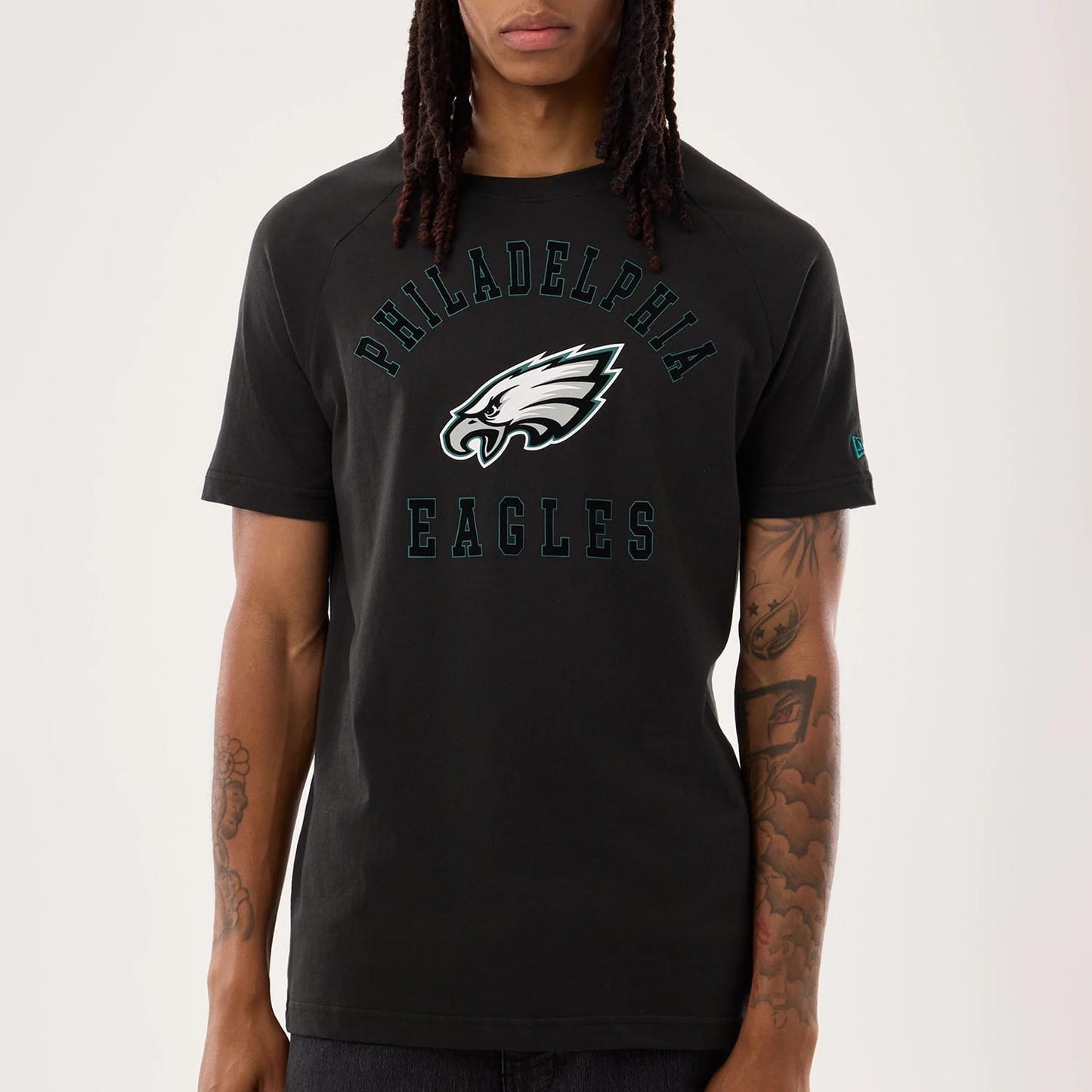 The model is wearing this NFL Sideline 2026 Philadelphia Eagles T-Shirt in black. 4