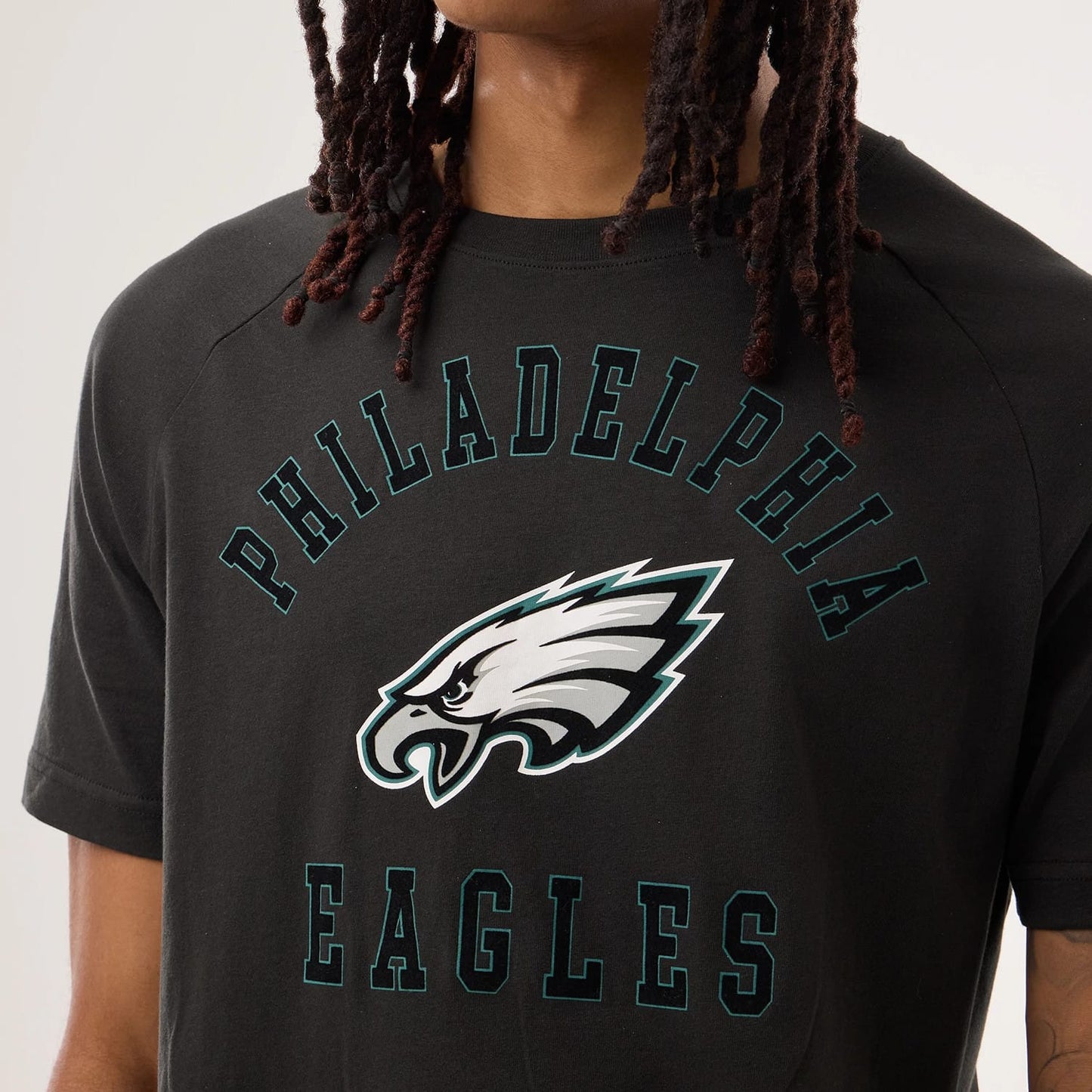 The model is wearing this NFL Sideline 2026 Philadelphia Eagles T-Shirt in black. 3