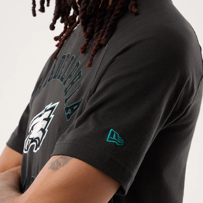 The model is wearing this NFL Sideline 2026 Philadelphia Eagles T-Shirt in black. 5