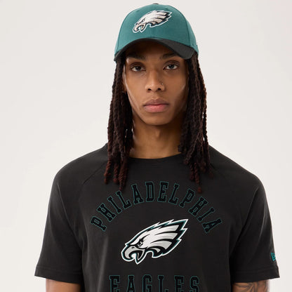 The model is wearing this NFL Sideline 2026 Philadelphia Eagles T-Shirt in black. 6