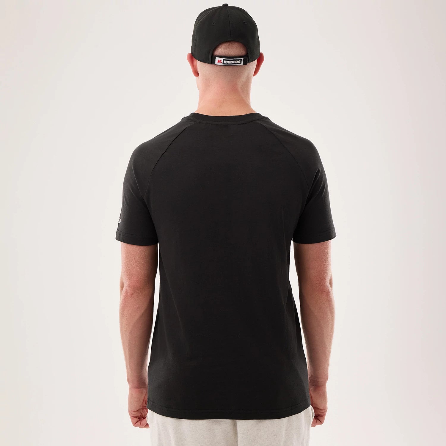 The model is wearing this NFL Sideline 2026 Las Vegas Raiders T-Shirt in black. 2