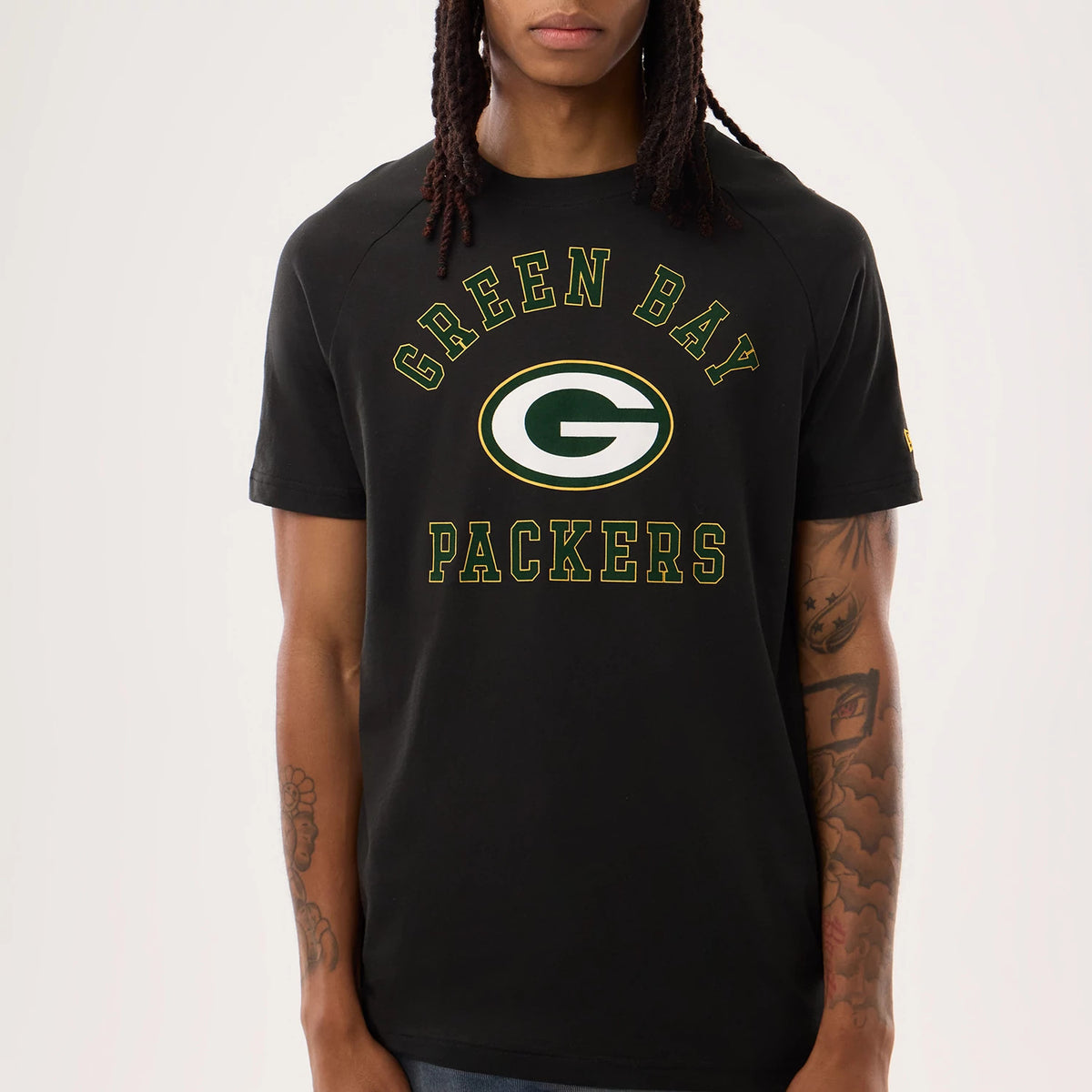The model is wearing this NFL Sideline 2026 Green Bay Packers T-Shirt in black. 4