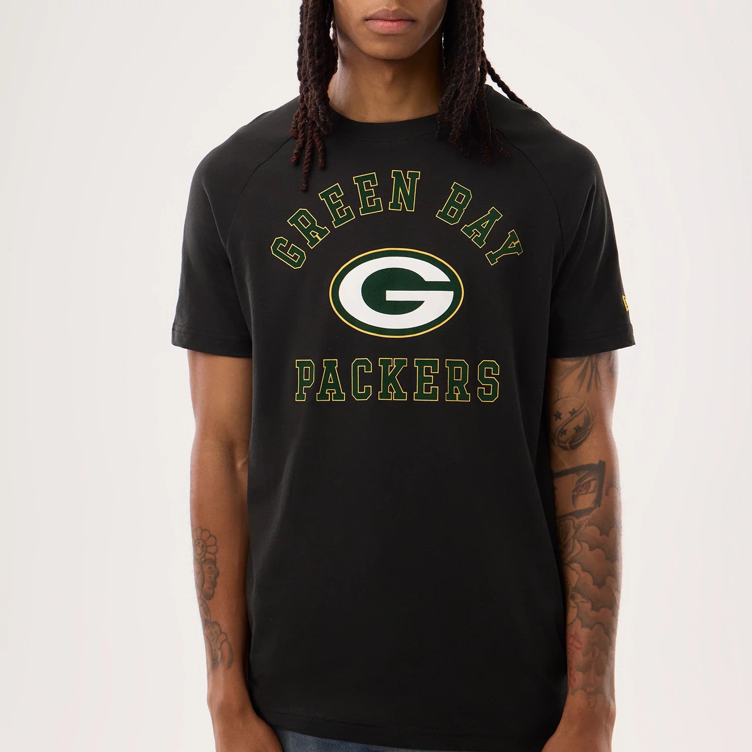 The model is wearing this NFL Sideline 2026 Green Bay Packers T-Shirt in black. 4