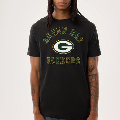 The model is wearing this NFL Sideline 2026 Green Bay Packers T-Shirt in black. 4