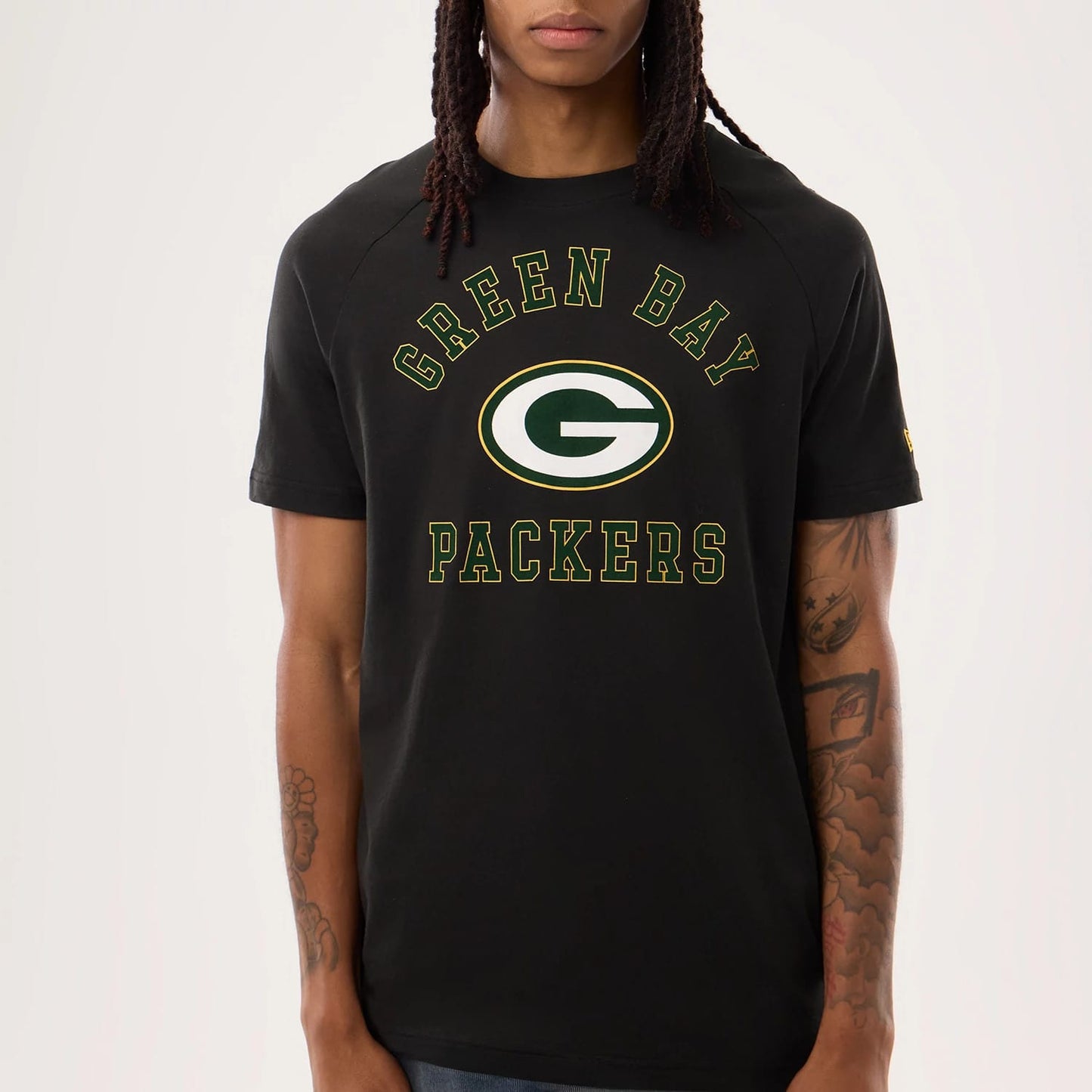 The model is wearing this NFL Sideline 2026 Green Bay Packers T-Shirt in black. 4