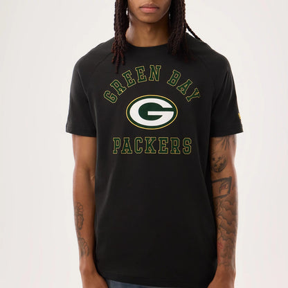The model is wearing this NFL Sideline 2026 Green Bay Packers T-Shirt in black. 4