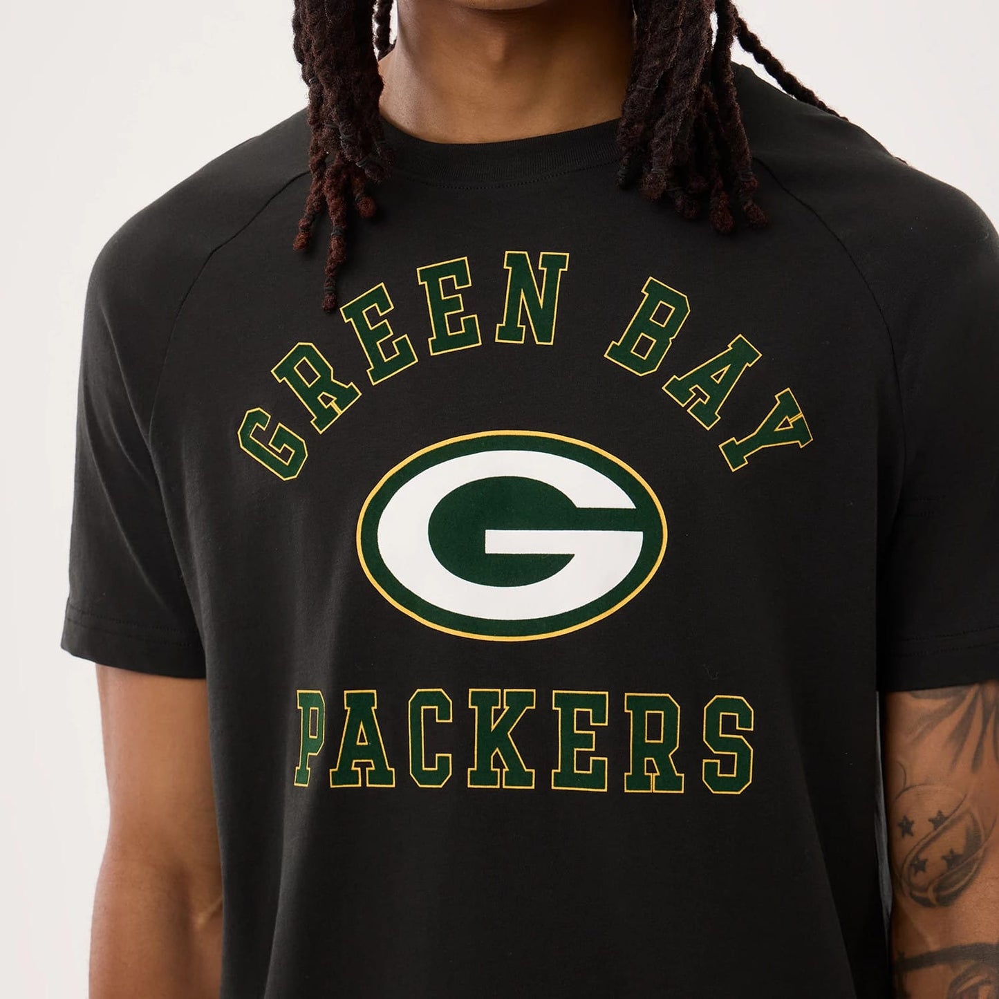 The model is wearing this NFL Sideline 2026 Green Bay Packers T-Shirt in black. 3