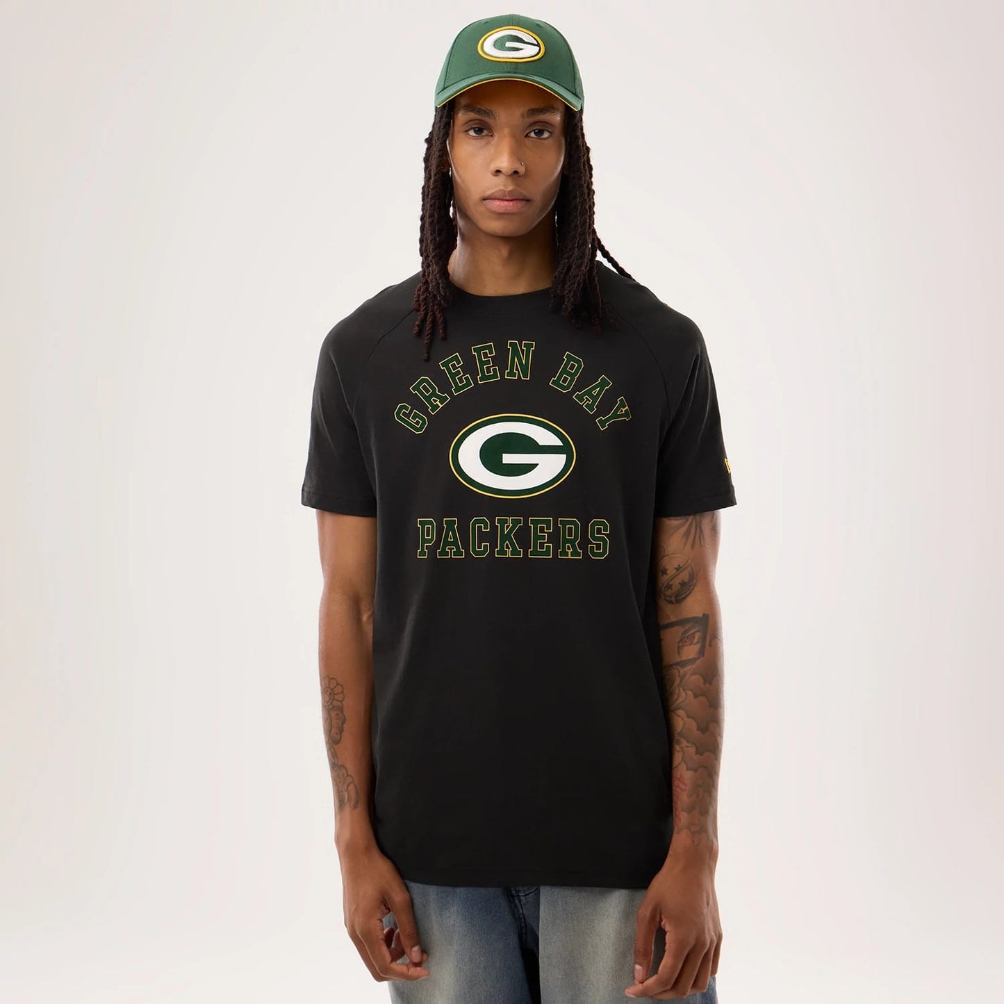 The model is wearing this NFL Sideline 2026 Green Bay Packers T-Shirt in black. 1