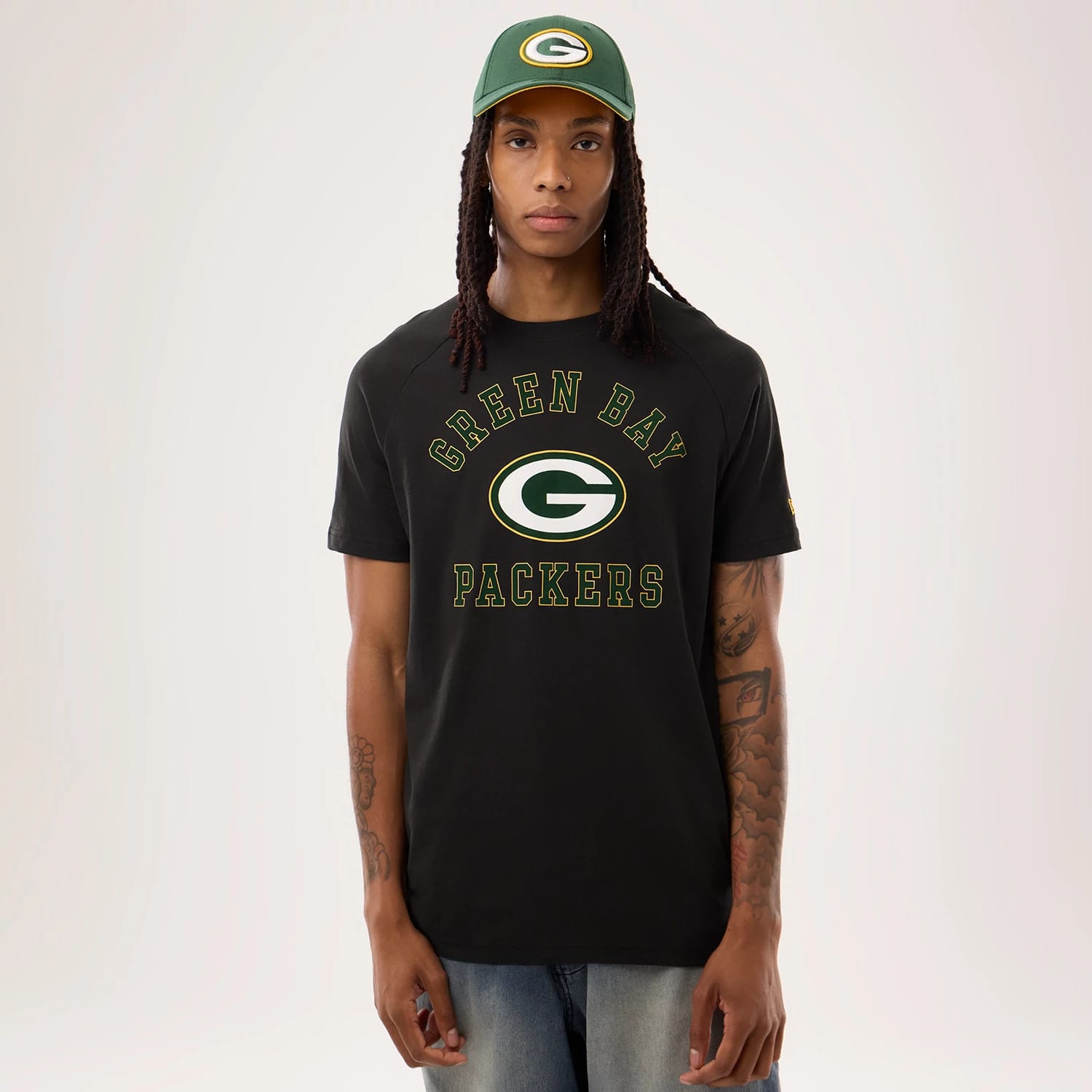The model is wearing this NFL Sideline 2026 Green Bay Packers T-Shirt in black. 1