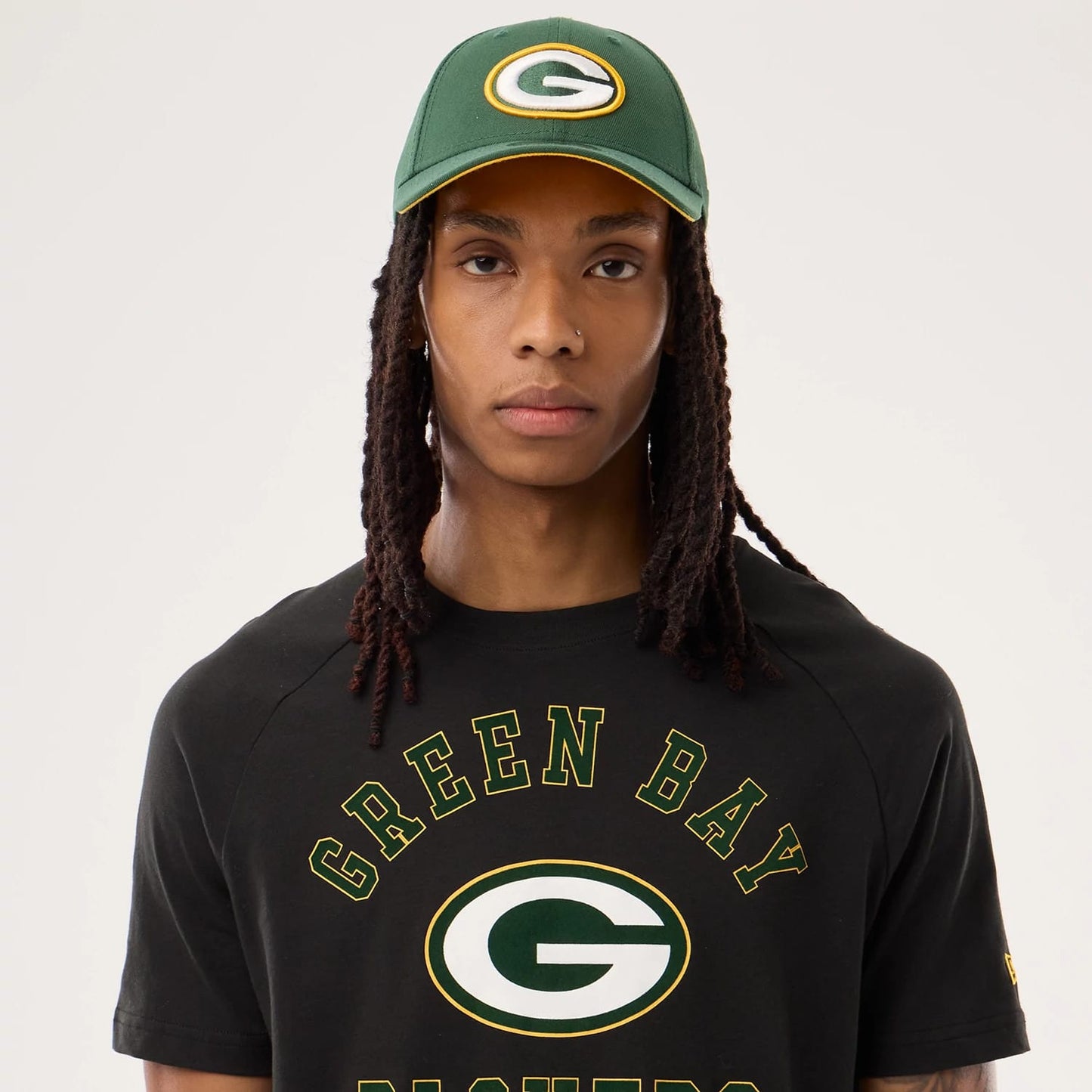 The model is wearing this NFL Sideline 2026 Green Bay Packers T-Shirt in black. 5