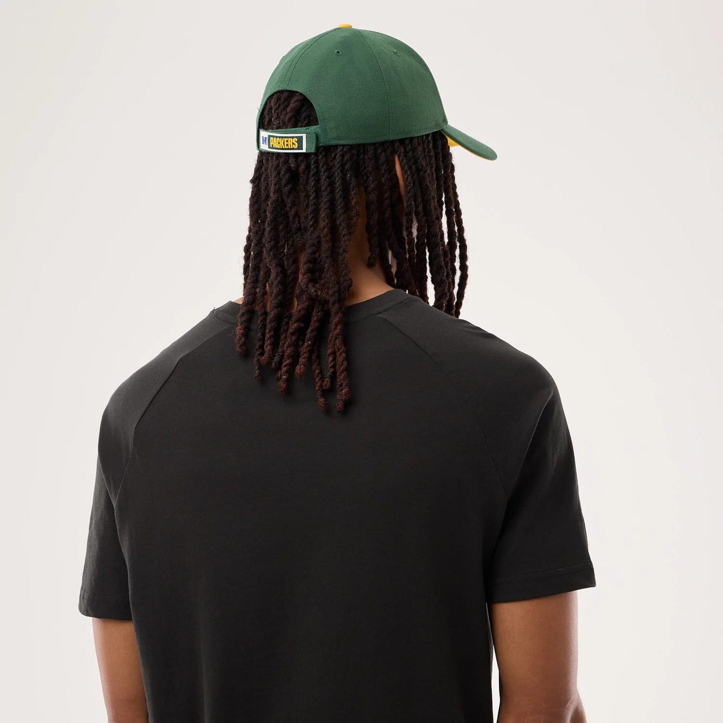 The model is wearing this NFL Sideline 2026 Green Bay Packers T-Shirt in black. 7