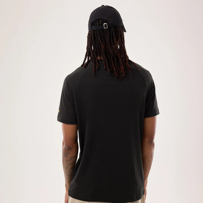 The model is wearing this NFL Sideline 2026 Pittsburgh Steelers T-Shirt in black. 2