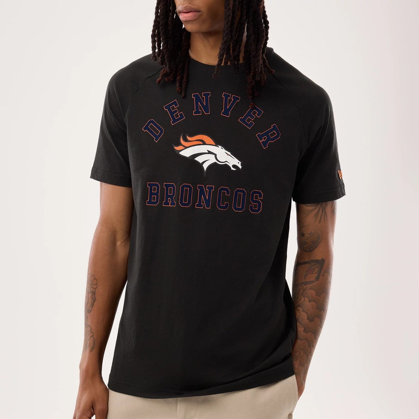 The model is wearing this NFL Sideline 2026 Denver Broncos T-Shirt in black. 3