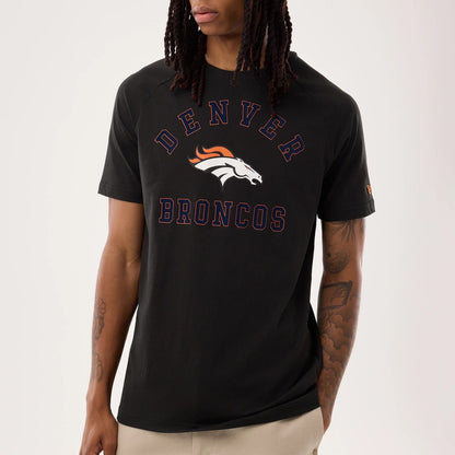 The model is wearing this NFL Sideline 2026 Denver Broncos T-Shirt in black. 3